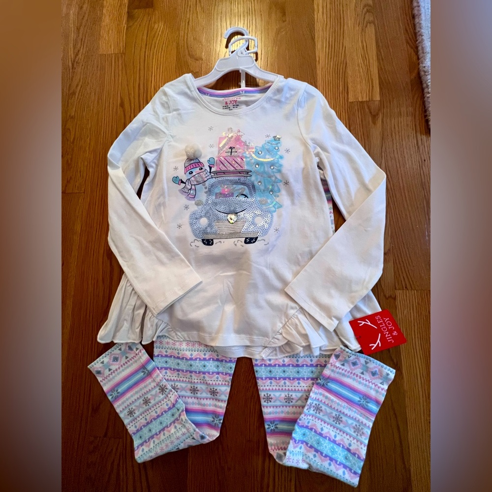 2 piece holiday set NWT. Winter scene contains gems and sequence on the front.